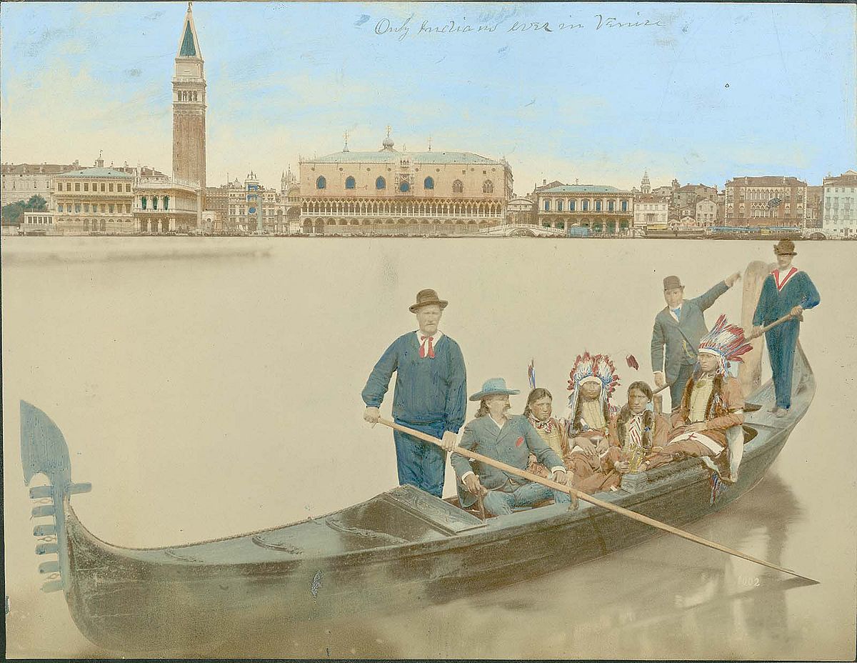 Hand-colored photograph by Paolo Salviati of Buffalo Bill and Indian members of the Wild West cast in Venice, April 1890. Garlow Collection. P.69.822
