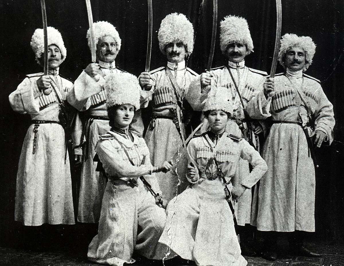 Georgian trick riders, including two women riders in front, ca. 1912. Clockwise from left: Kirile Pirtskhalaishvili, Kitilia Kvitaishvili, Kristephore Imnadze, Veliko Kvitaishvili, Varden Kvitaishvili, Barbale Zakareishvili-Imnadze, Maro Zakareishvili-Kvitaishvili. Collection of Irakli Makharadze.