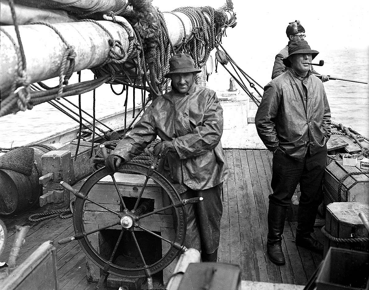 Bartlett (with pipe) on the deck of the Morrissey with McCracken right behind him. MS 305 Harold McCracken Photograph Collection, McCracken Research Library. N282#A1023V