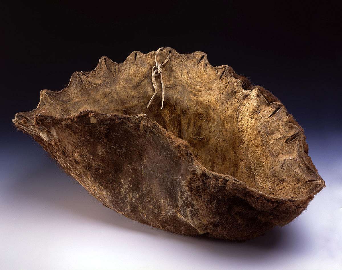 Buffalo hide bowl. Chandler-Pohrt Collection, Gift of Mr. William D. Weiss. NA.106.243