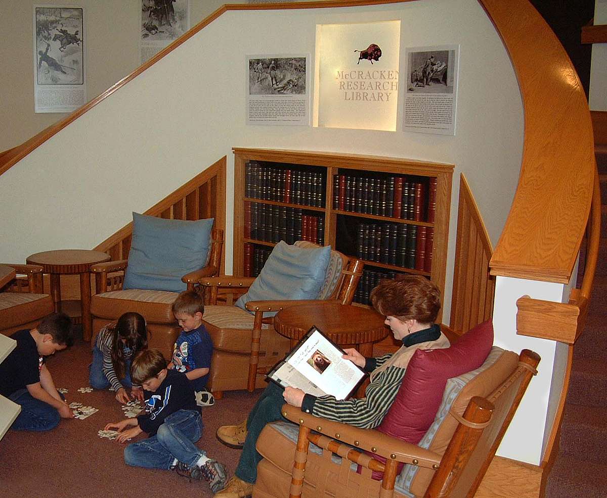 Patrons enjoy a comfortable nook in the Library Gallery outside the Reading Room in 2005.