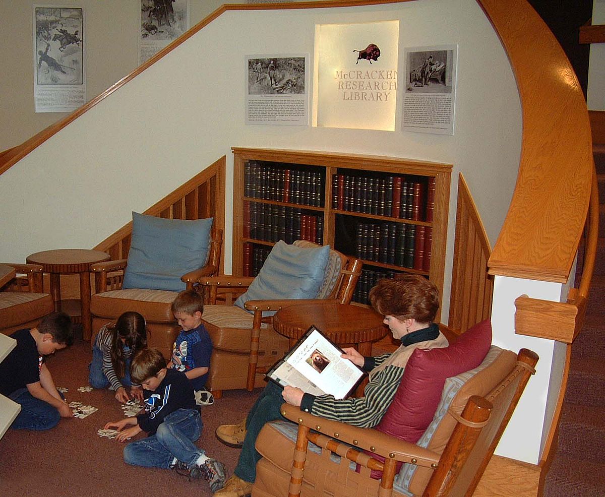 Patrons enjoy a comfortable nook in the Library Gallery outside the Reading Room in 2005.