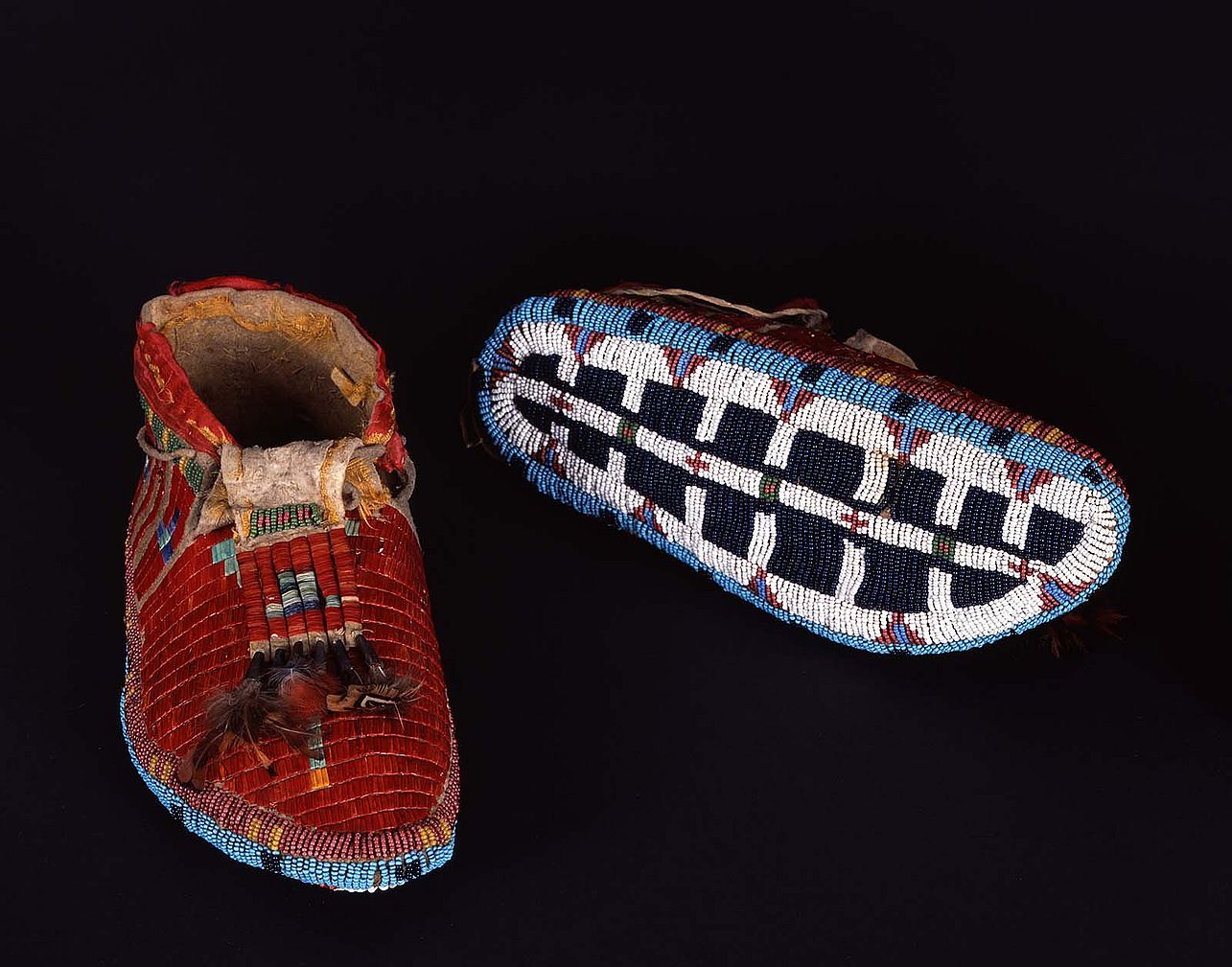 Lakota moccasins, ca. 1880. The Paul Dyck Plains Indian Buffalo Culture Collection acquired through the generosity of the Dyck family and additional gifts of the Nielson Family and the Estate of Margaret S. Coe. NA.202.1183