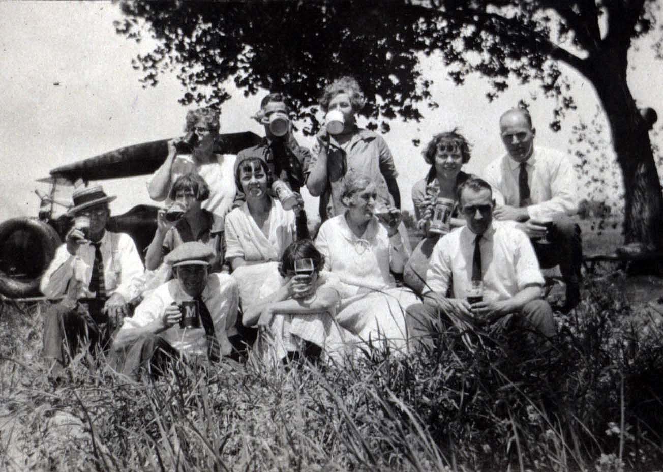 A festive group imbibing from mugs and glasses. MS 322 John Wallace Crawford Collection, McCracken Research Library. P.322.0331