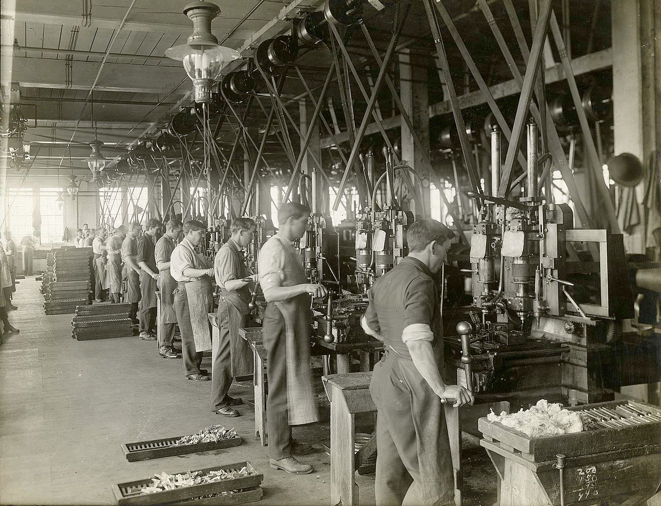 Working the drill presses, Winchester plant, 1912. MS 20 Winchester Repeating Arms Company Collection, McCracken Research Library. P.20.2994
