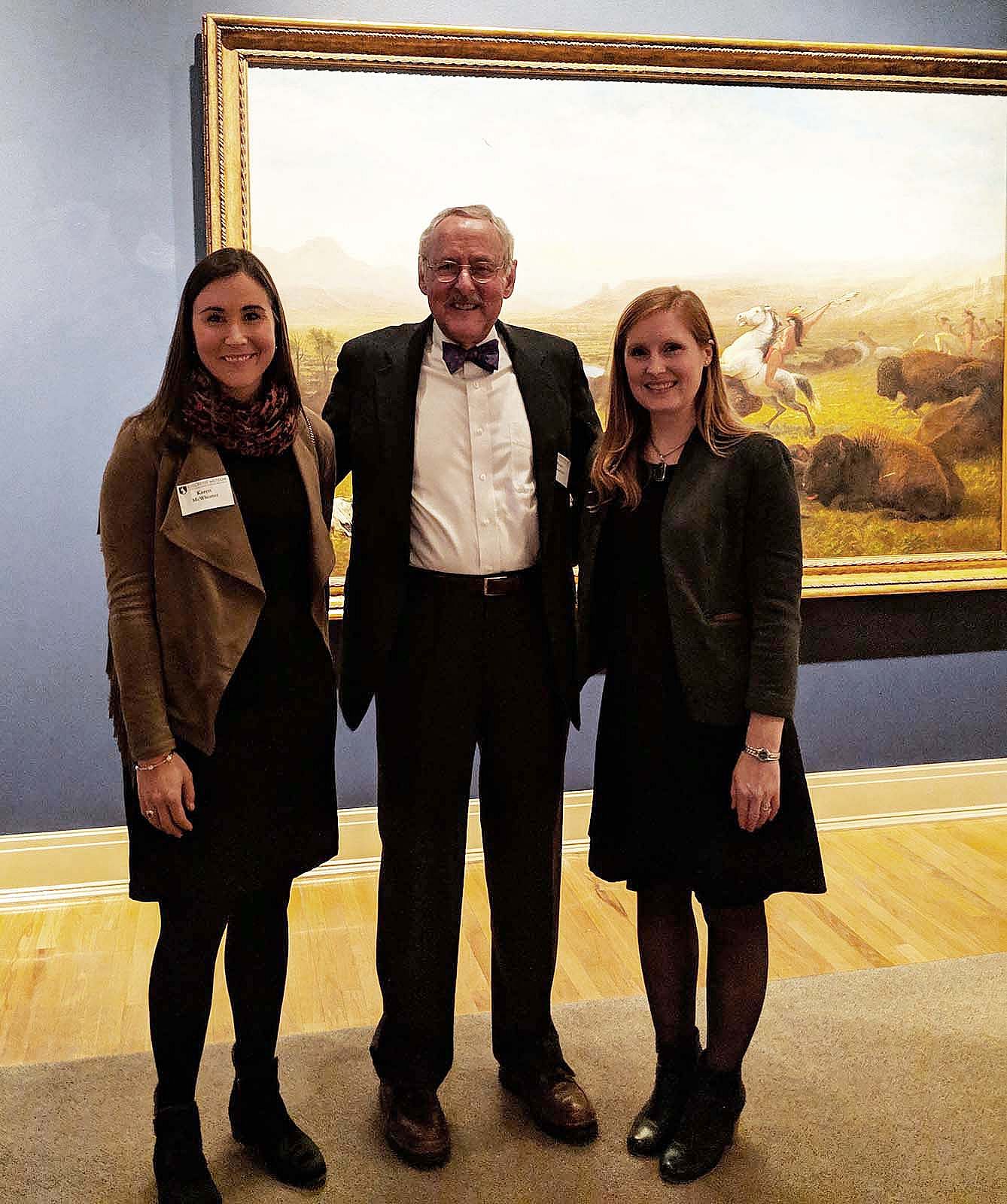 Karen McWhorter, Peter Hassrick, and Laura Fry standing in front of Albert Bierstadt's "The Last of the Buffalo," Gilcrease Museum.