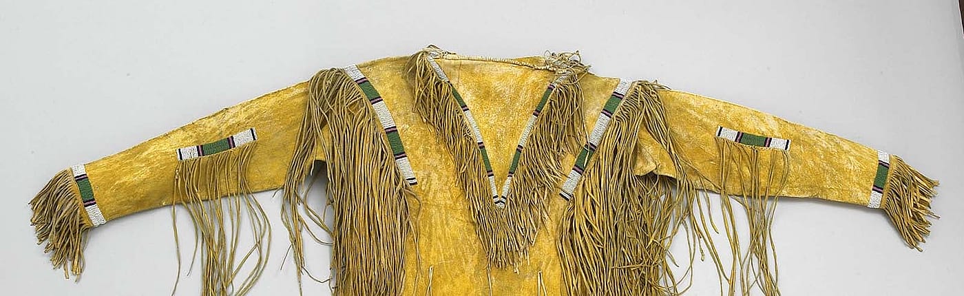 Shirt, ca. 1890. Ute, Northern Plains. Tanned deer hide, pigments, beads. Gift of Mr. J.C. Kid Nichols. NA.202.206 (detail)