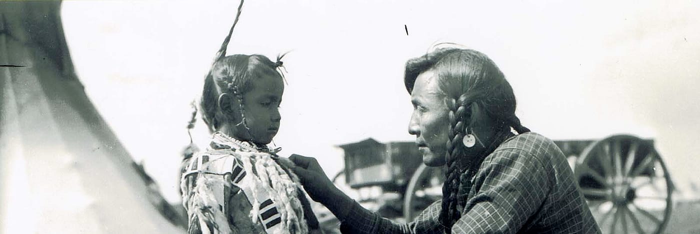 Native American man with young boy. MS 438 Forrest Fenn Indian Photographs. P.438.0144