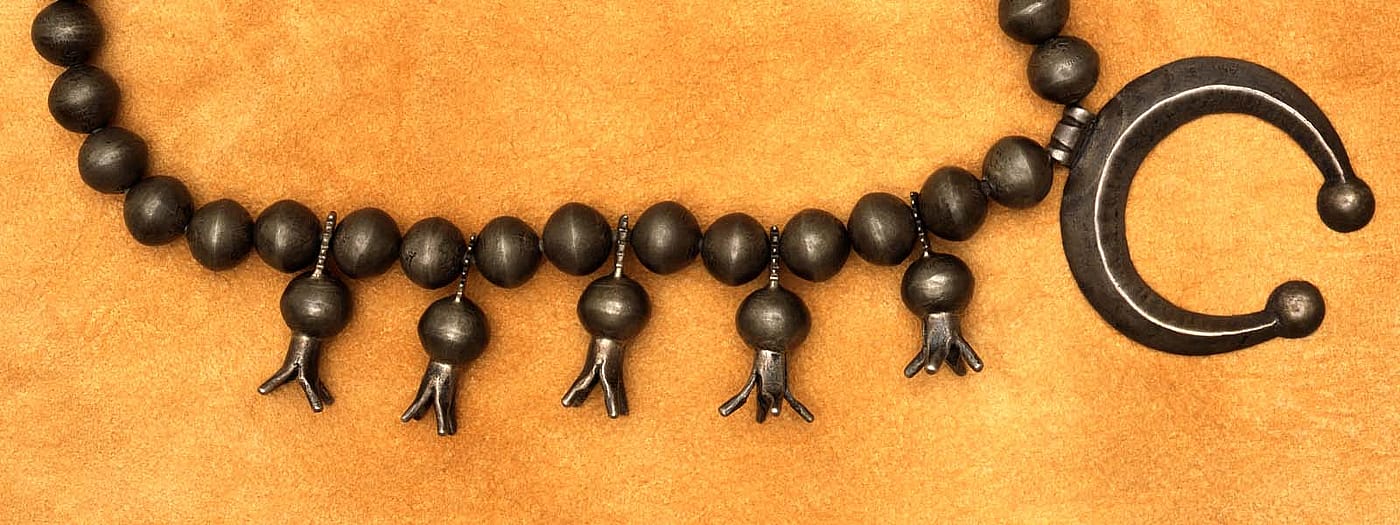 Squash blossom necklace. Gift of Betty Lou Sheerin. NA.203.1355