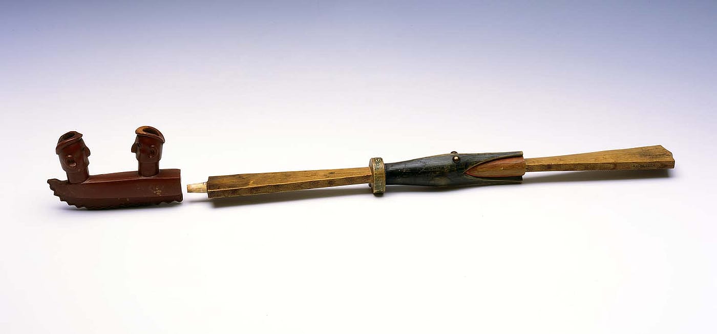 Pipe Bowl and Stem. Lakota (Sioux), Northern Plains, ca. 1865. Pipestone (catlinite), wood, pigment, brass tacks. Adolf Spohr Collection, Gift of Larry Sheerin. NA.504.125