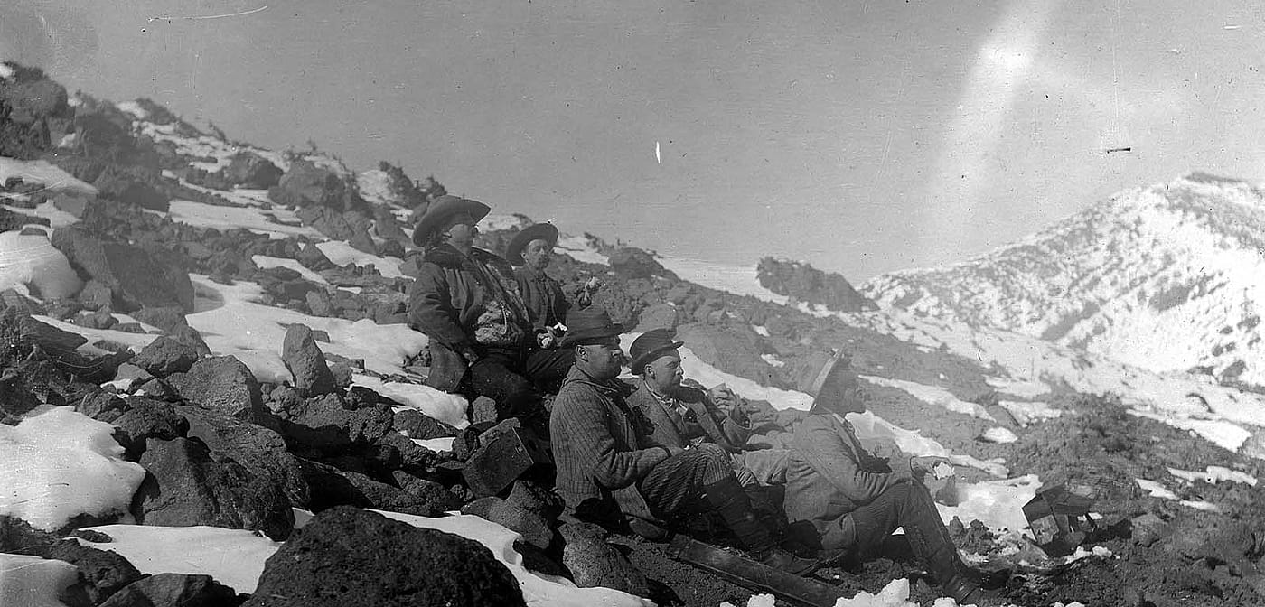 Cody's expedition to the North Rim of the Grand Canyon halted on this volcanic slope near Flagstaff to take a rest and enjoy the view in winter 1892. MS 6 William F. Cody Collection. P.69.1094 (detail)