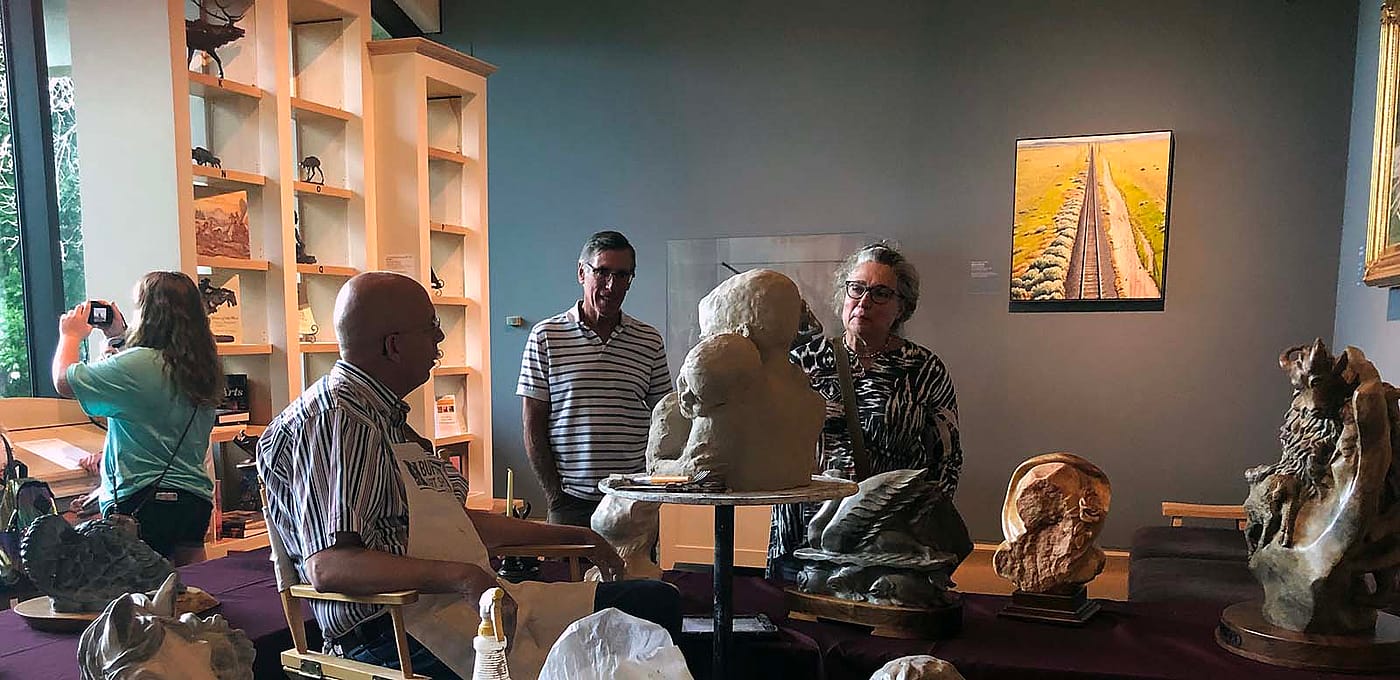 Artist-in-Residence Jeff Rudolph in the Whitney Western Art Museum.