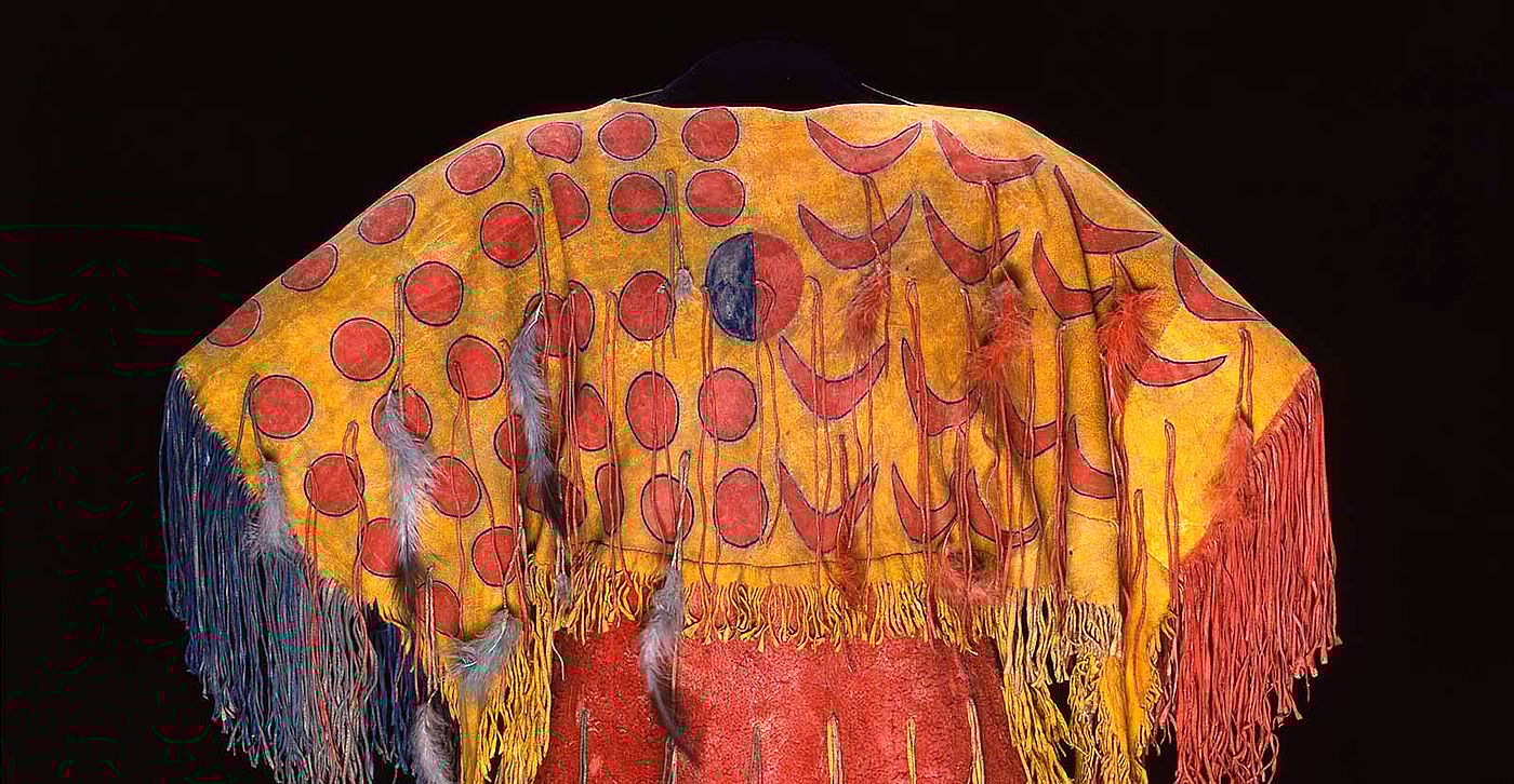Ghost Dance dress, Southern Arapaho, c. 1890, 54 x 54 inches. Tanned elk hide with numerous pigments, feathers, and fringe. Chandler-Pohrt Collection. Gift of Mary J. and James R. Jundt. NA.204.4 (detail)