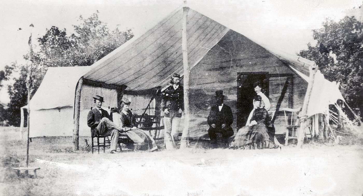 George Armstrong Custer (standing), Libby Custer (second from left) and others on Big Creek, Hays, Kansas, 1867. MS 71 Vincent Mercaldo Collection, McCracken Research Library. P.71.277