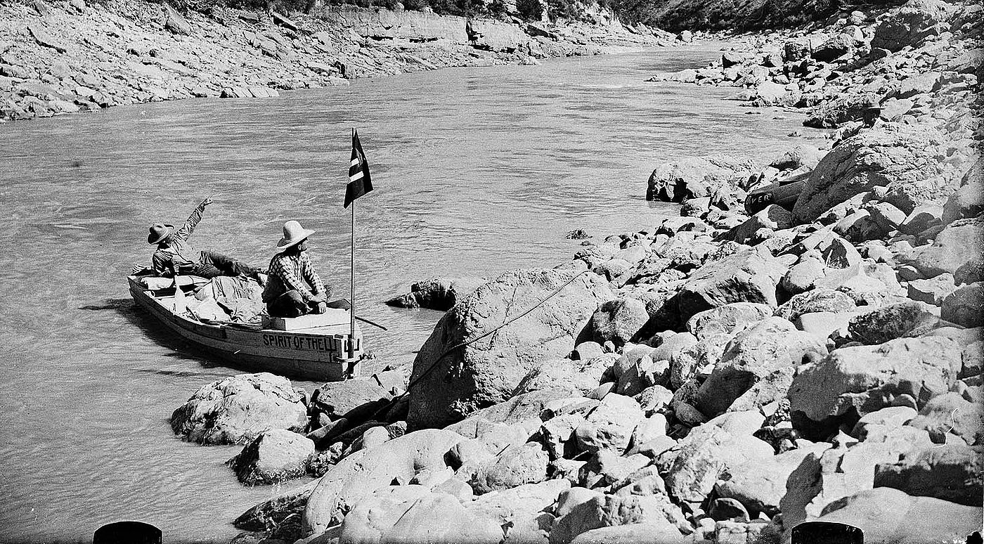 Glass plate negative by Charles J. Belden (1887-1966). Alton Wickwire and Carl Dunrud with the boat "Spirit of the Pitchfork" on the Big Horn River before it was dammed, August 1928. Charles Belden Collection. PN.67.432b (detail)