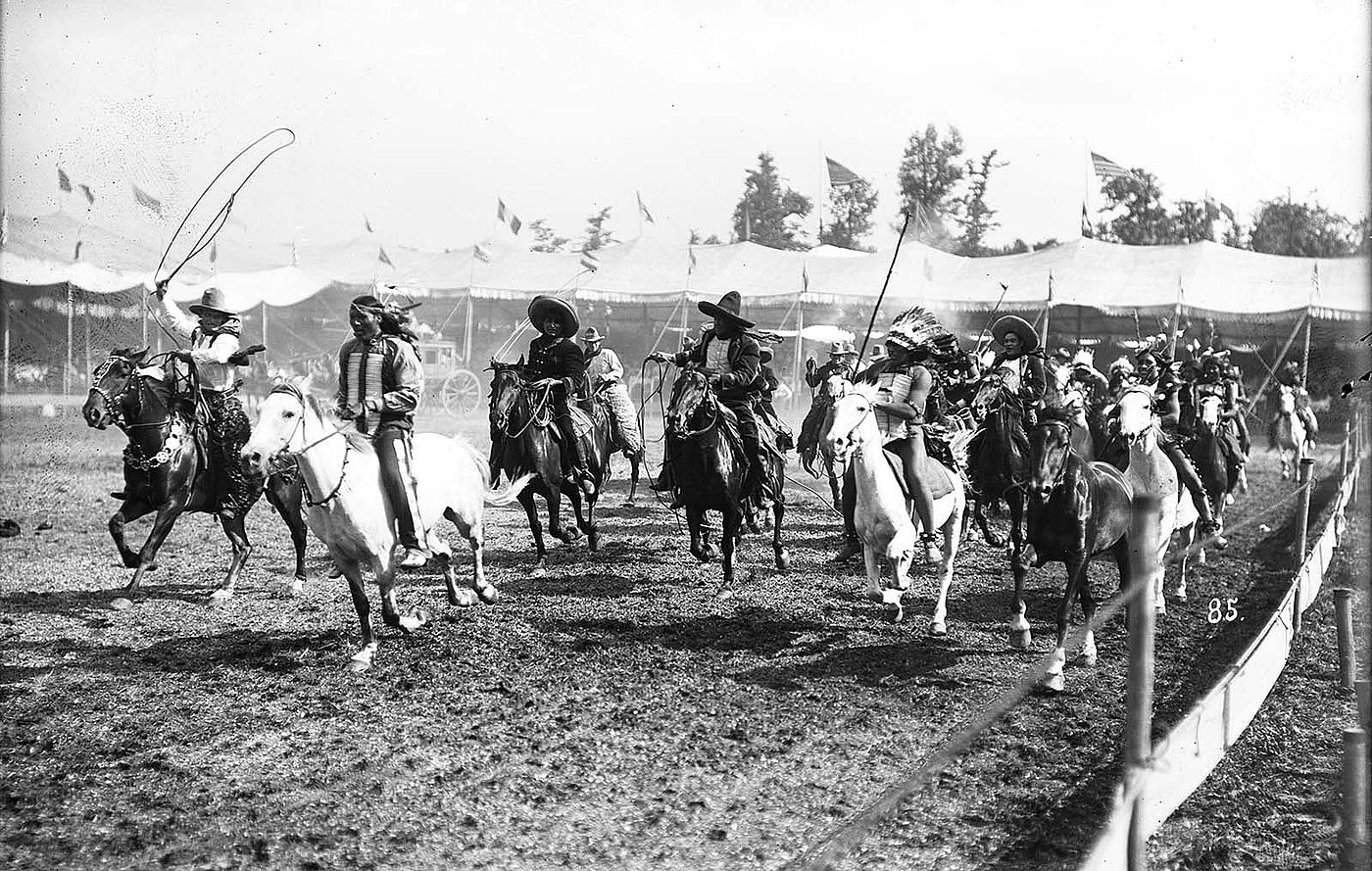 Cowboys and Indians in Wild West arena, ca. 1900. Photo by Burke and Karetke, Chicago. S 47 David R. Phillips Collection, McCracken Research Library. PN.47.23
