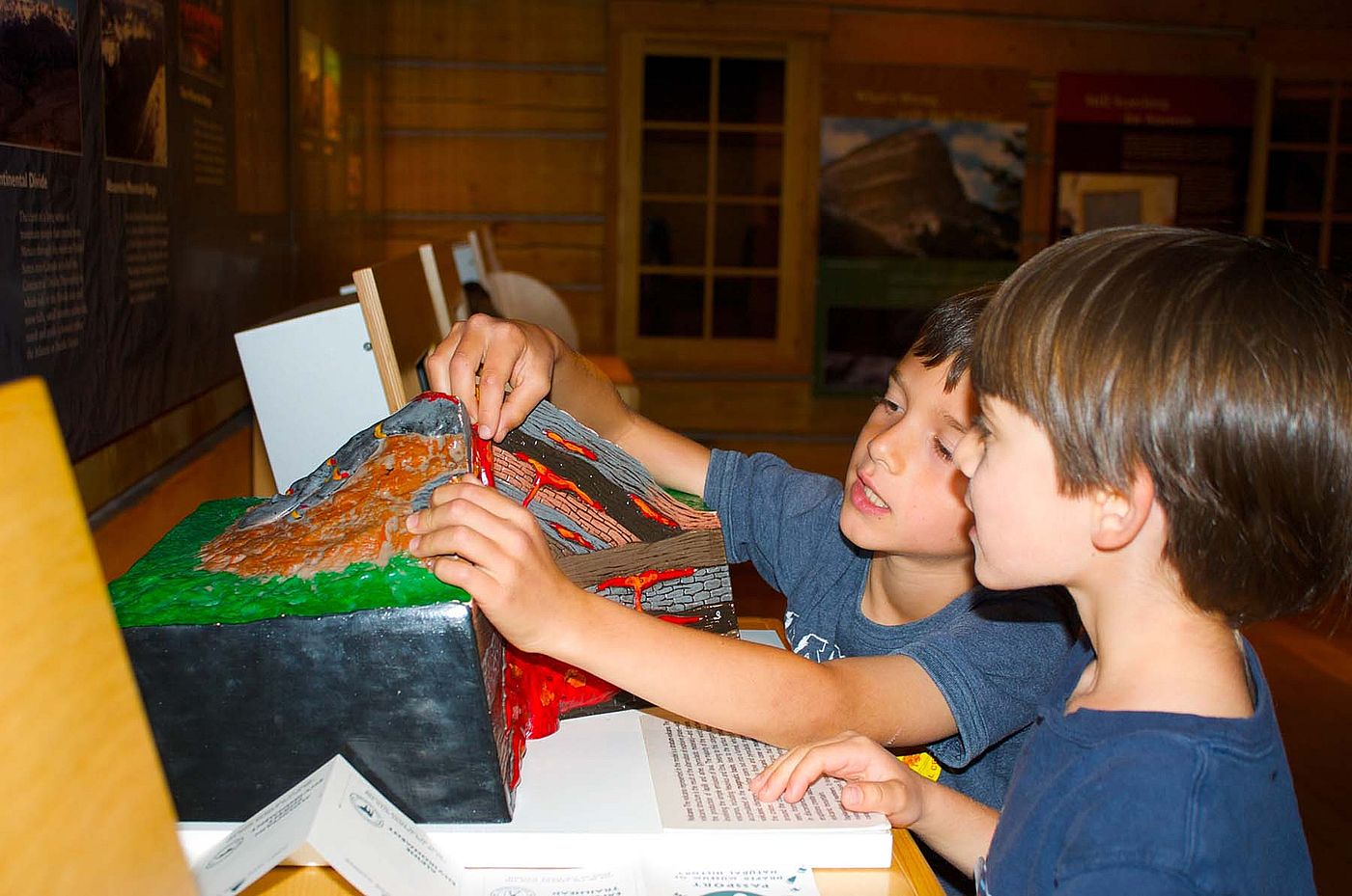 Children learn about volcanoes in the Draper Natural History Museum.