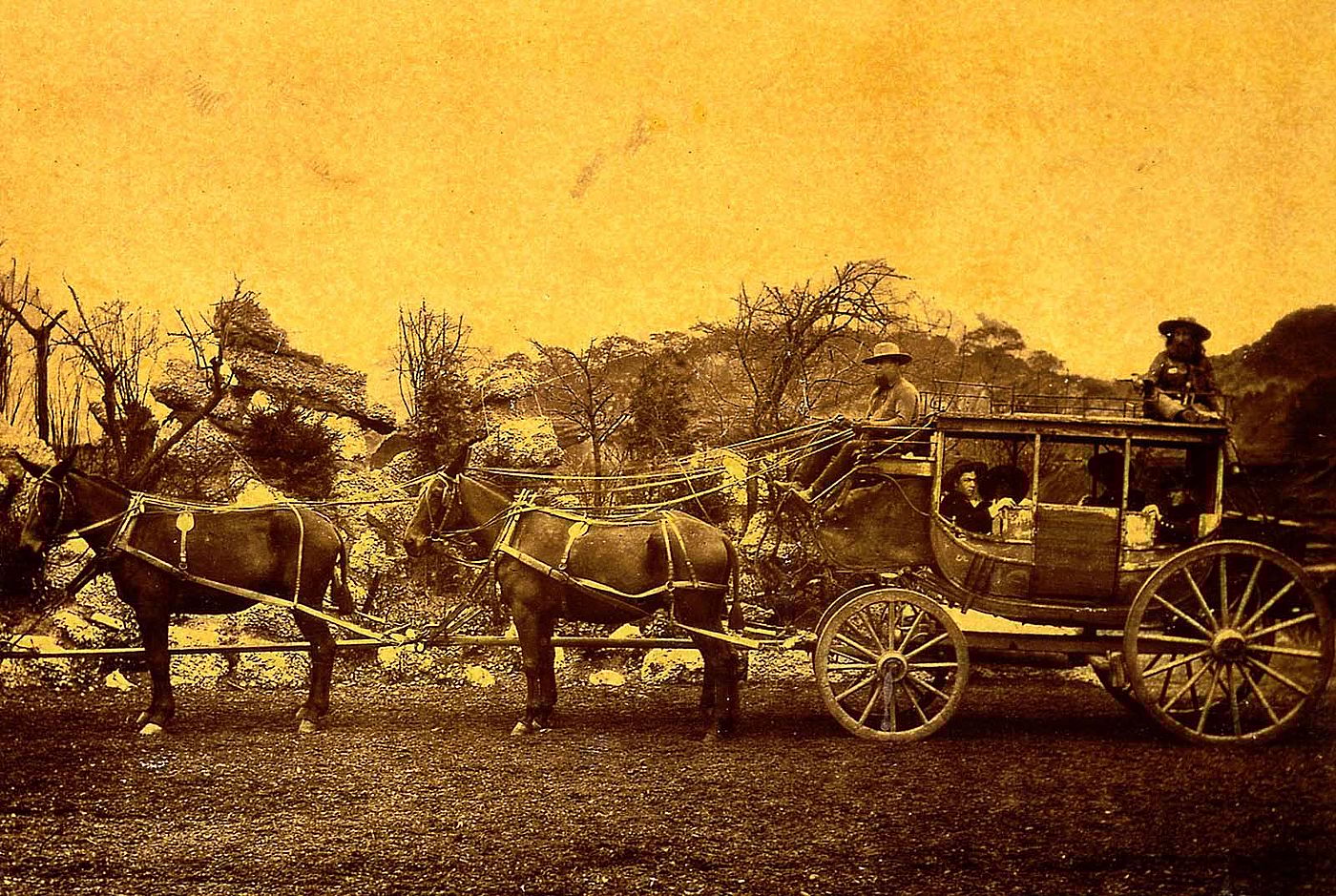 Deadwood stagecoach, here pictured in Buffalo Bill's Wild West, ca. 1900. Buffalo Bill claimed the coach was a refurbished stagecoach that had indeed been robbed on the Cheyenne - Deadwood route, later attacked by Indians, and then abandoned alongside the trail where he reclaimed it. Gift of Mr. and Mrs. George Strobel. P.6.59