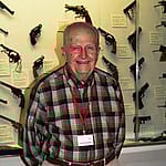 Curator Warren Newman