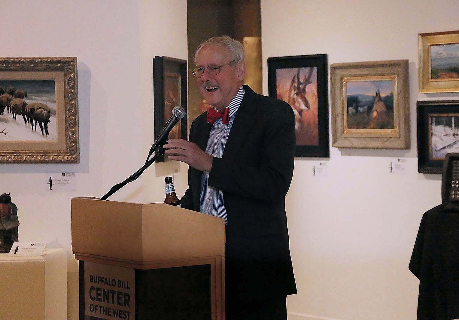 Peter Hassrick presenting from a podium