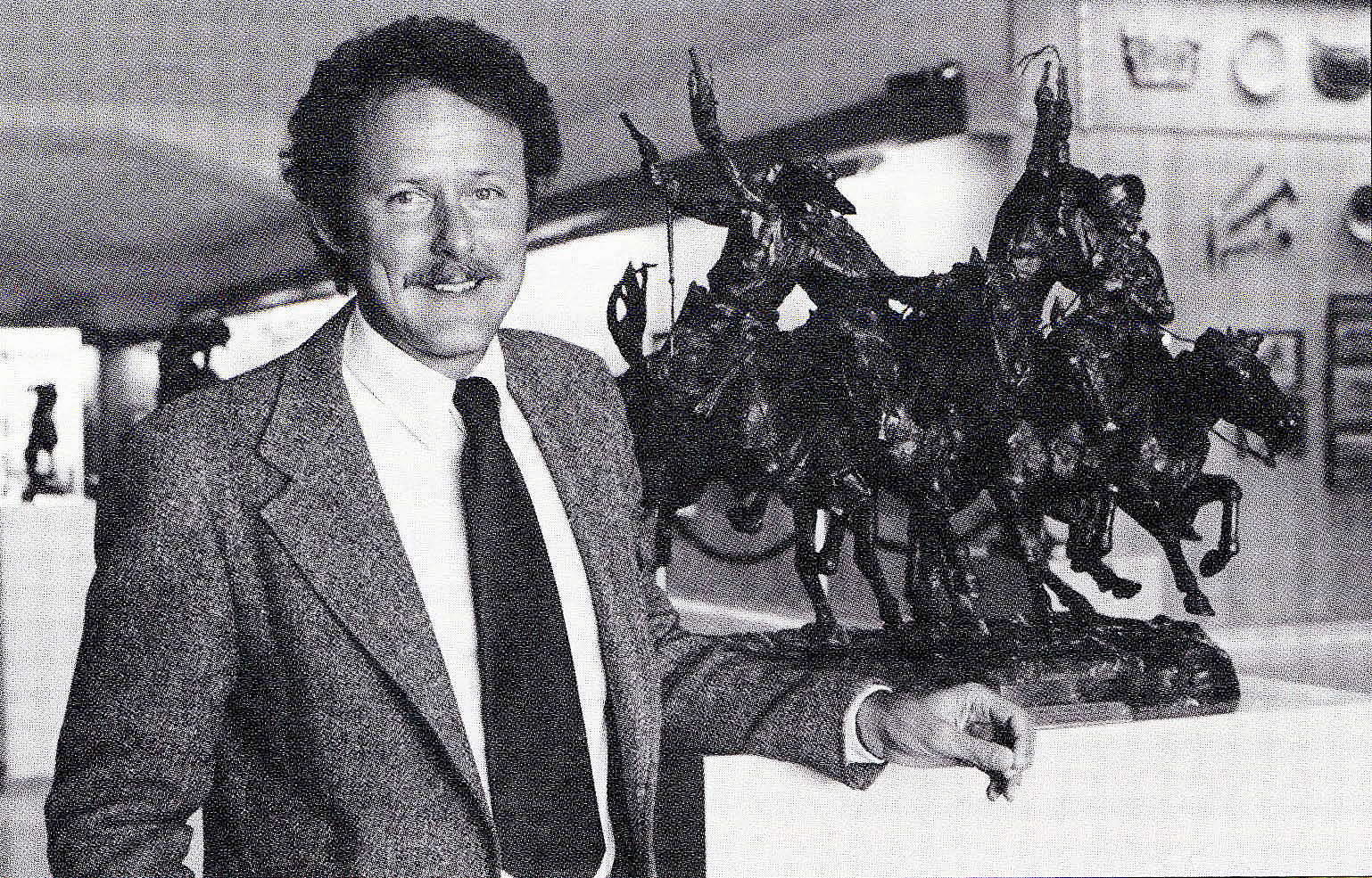 Peter Hassrick in newsprint, with Frederic Remington's "Coming through the Rye," 1981.
