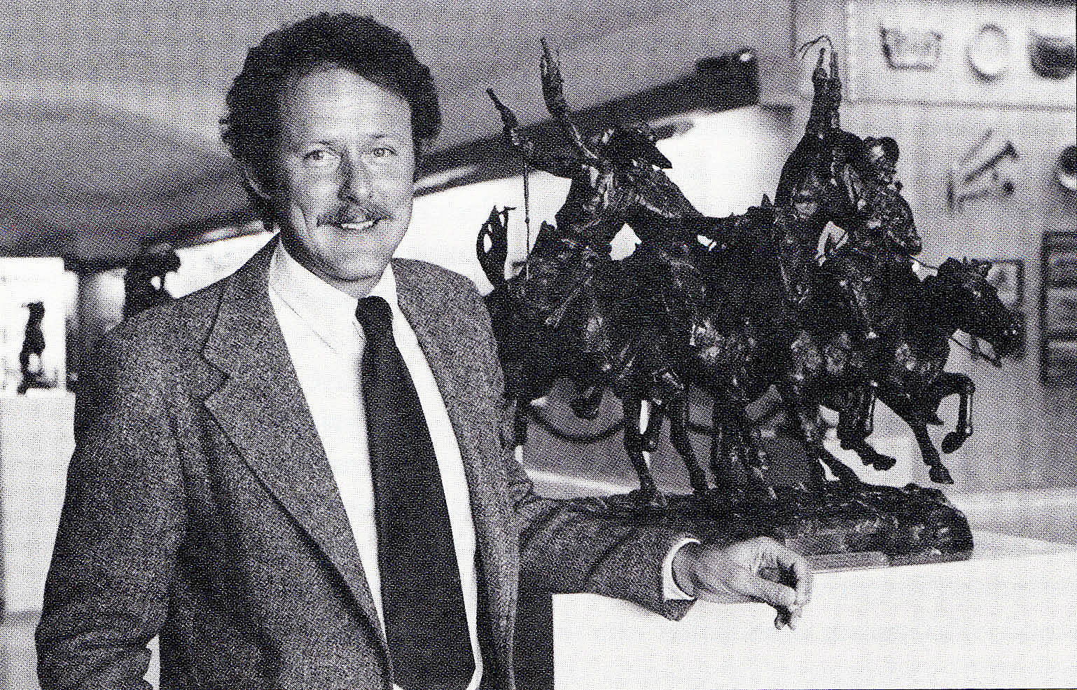 Peter Hassrick in newsprint, with Frederic Remington's "Coming through the Rye," 1981.