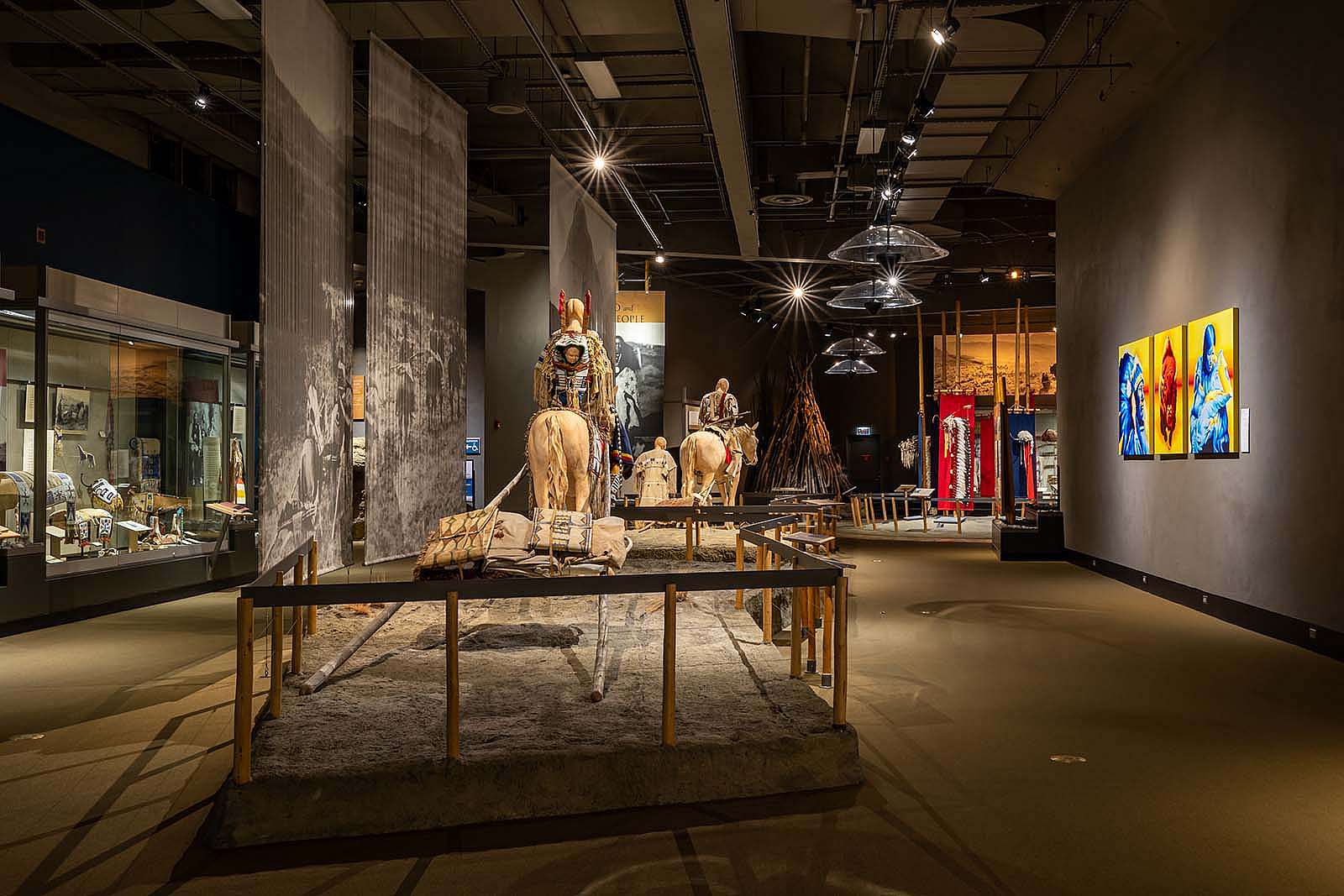 Plains Indian Museum, Cheyenne migration scene with horse and dog travois.