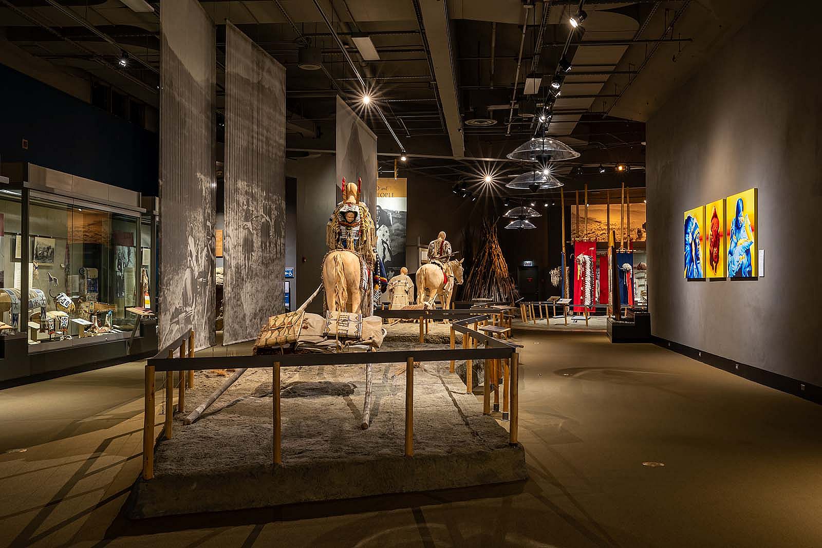 Plains Indian Museum, Cheyenne migration scene with horse and dog travois.