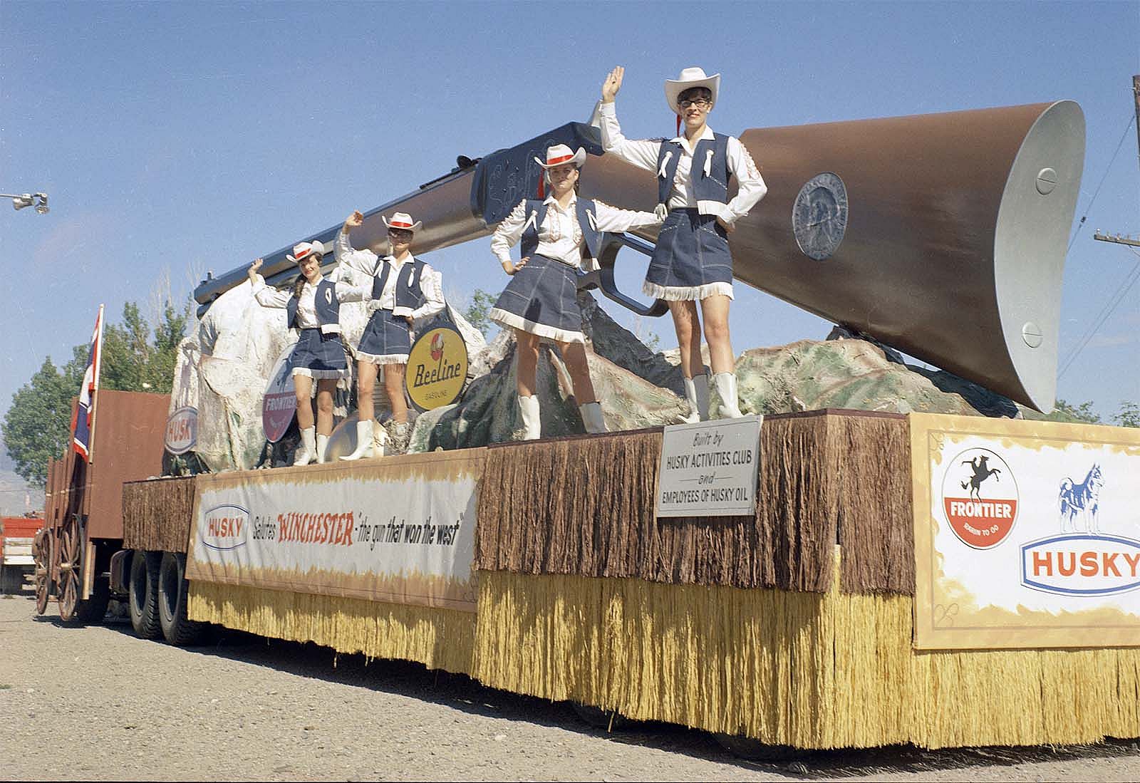 Husky Oil Company's float celebrating "Winchester: the gun that won the West," July 4, 1968. MS 089 Jack Richard Photograph Collection, McCracken Research Library. PN.89.49.10081.147