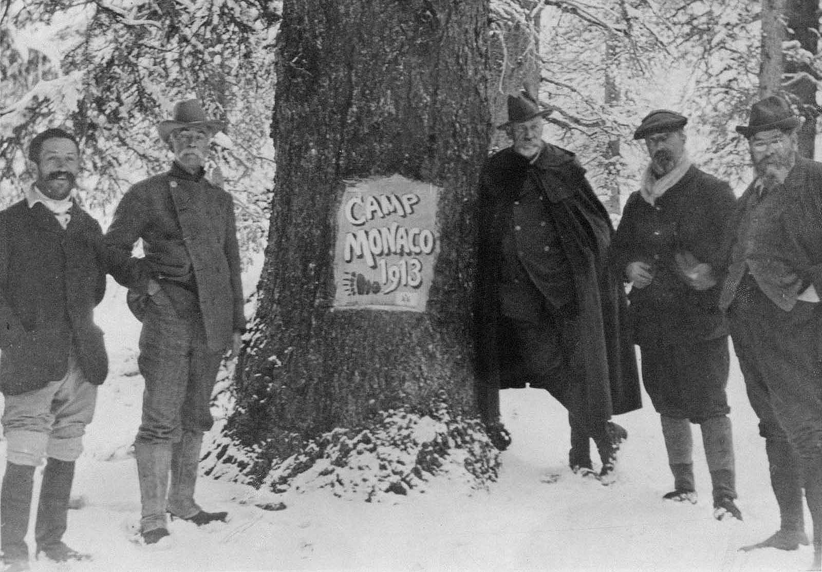 The hunting party at Camp Monaco, September 1913. Leaning on the tree is Prince Albert I of Monaco; A.A. Anderson is on the other side of the tree. MS 6 William F. Cody Collection, McCracken Research Library, Buffalo Bill Center of the West, Cody, Wyoming, USA. P.69.296
