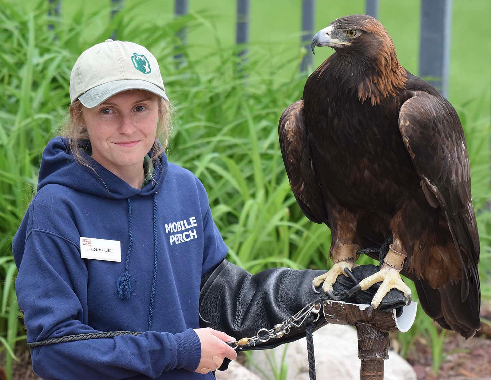 Chloe Winkler with golden eagle Kateri.
