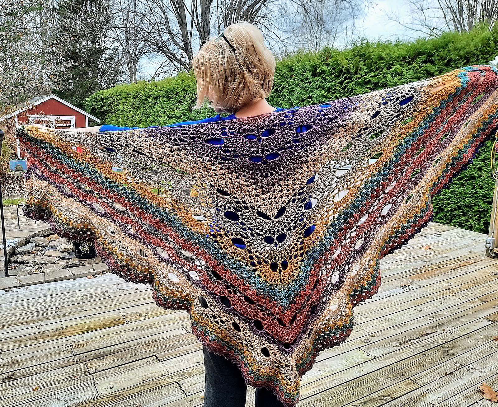 Multi-colored knitted shawl by Karen Penders St. Clair.