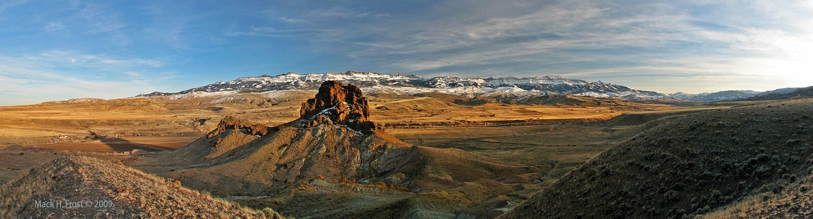 Panoramic view of rock formation Castle Rock with Carter Mountain in background. Mack Frost photo.