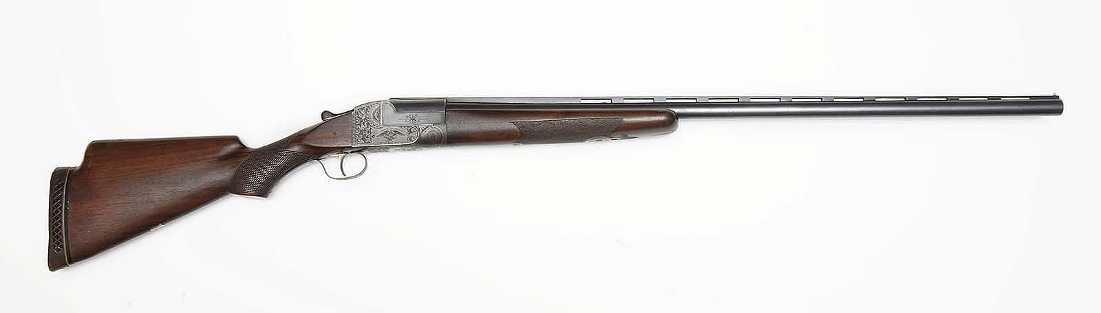 Ithaca Single Barrel Trap Gun, 12 gauge, Serial Number 264501, owned by Annie Oakley, stock was changed by a later owner. Gift of Donald Lawson In Honor and Memory of Joseph L. Box. 2008.10.1