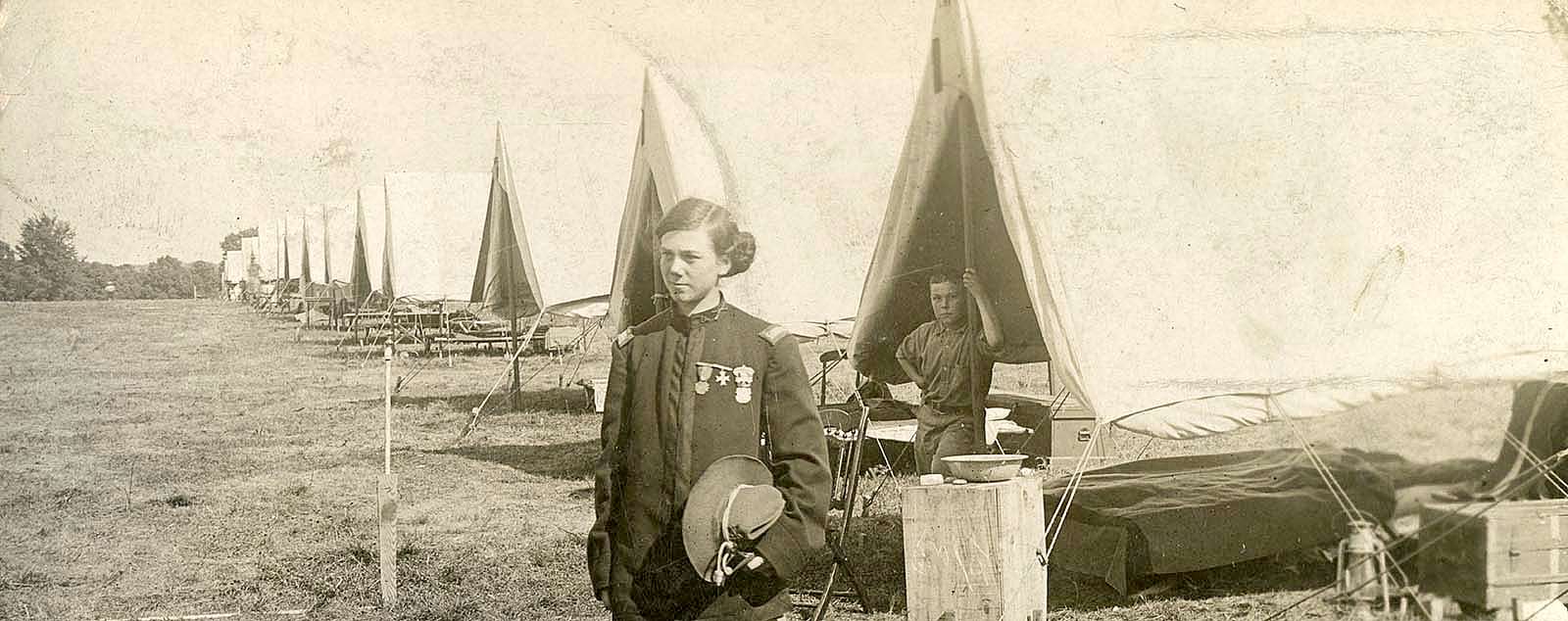 Cody Bell, with his hair in buns, at a National Guard encampment in 1909. MS 294 William A. Bell Family Collection, McCracken Research Library. P.294.0030 (detail)
