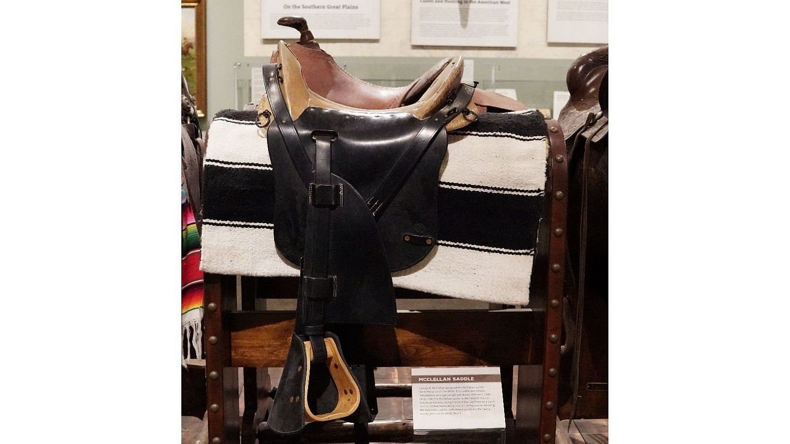 McClellan Saddle exhibit, showcasing its military design and simplicity.