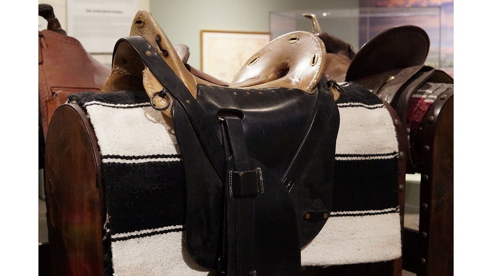 Close-up of the McClellan Saddle, highlighting its unique shape and leatherwork.