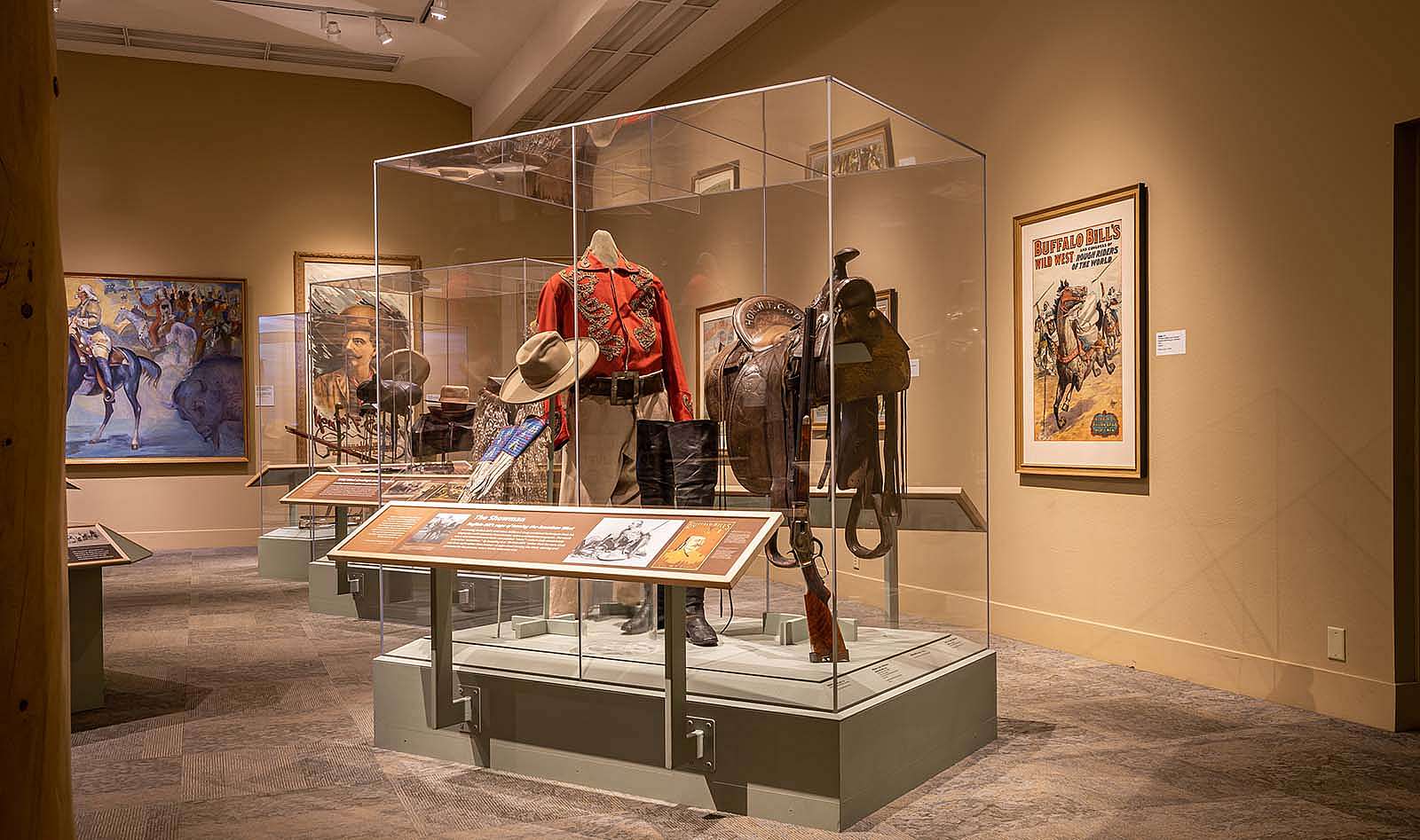 Buffalo Bill Museum with "The Showman" case displaying shirt, hat, saddle from Buffalo Bill's show career.