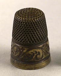 Louisa Cody's brass thimble. Museum purchase, Garlow Collection. 1.69.184.28