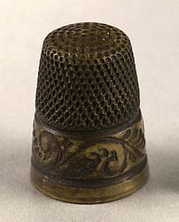 Louisa Cody's brass thimble. Museum purchase, Garlow Collection. 1.69.184.28