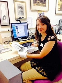 Hannah working with the Forrest Fenn collection photographs. 
