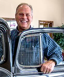 Brett Whitlock of Whitlock Motors works with the Center of the West to select a raffle car.