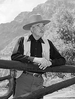 Fig. 9: Larry Larom at his Valley Ranch, located along the South Fork of the Shoshone River southwest of Cody, Wyoming, ca. 1950. MS 089 Jack Richard Photograph Collection, McCracken Research Library. PN.89.116.21416.1 (detail).