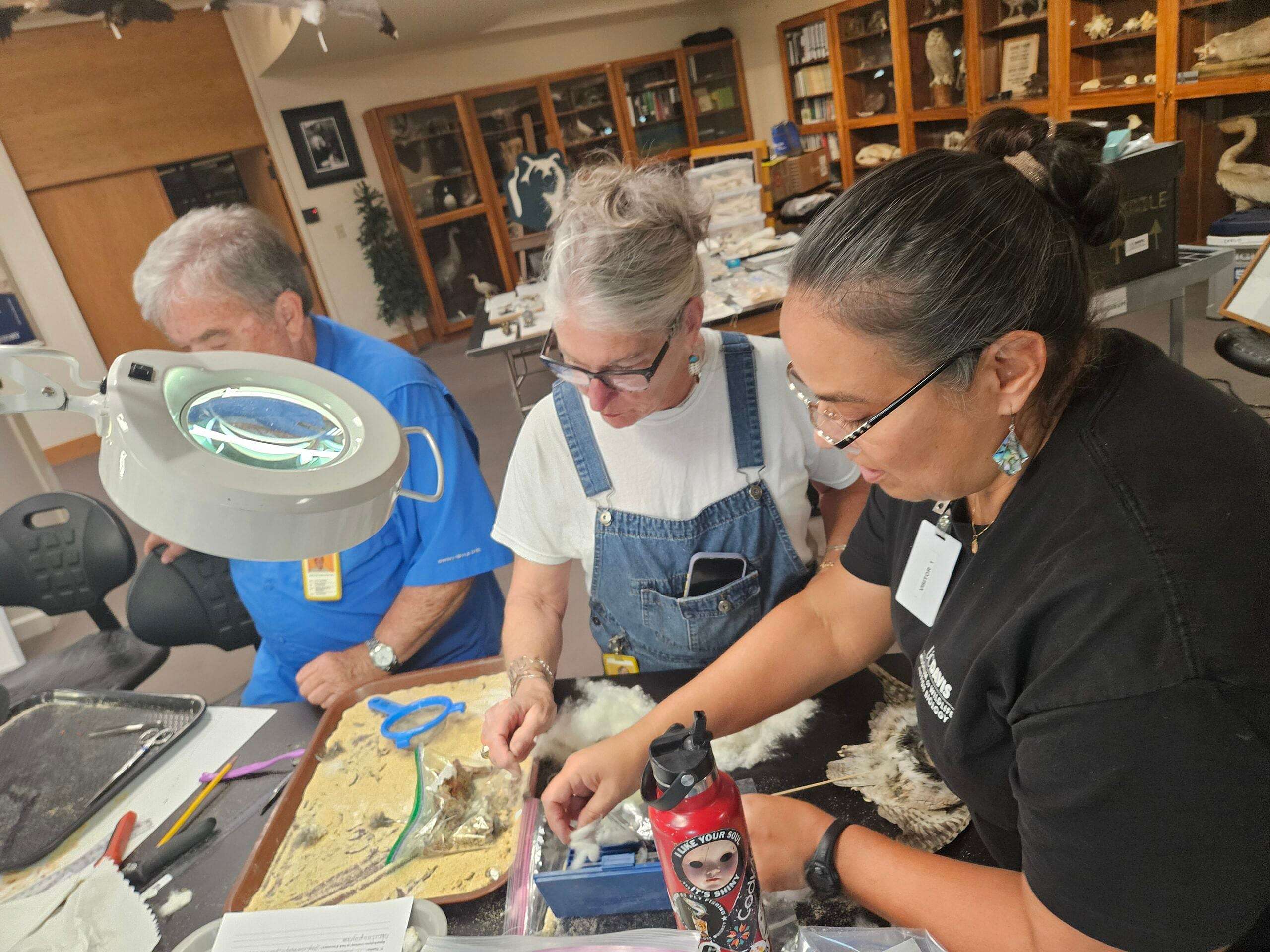 Dr. Irene Engilis works with volunteer Susan Bishop.