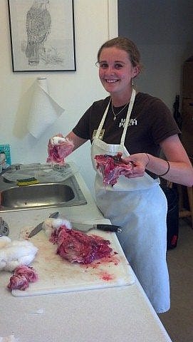 Nicole preparing the birds' dinner.