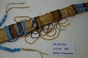 Close up of knife sheath before treatment.