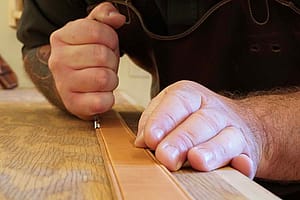 Leather craftsman Levi Nelson's hands