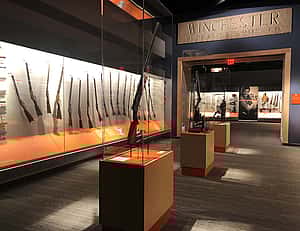 Firearms and the West gallery in the Cody Firearms Museum, with Winchester Factory lintel.