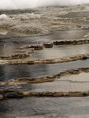 Winter in Yellowstone: water and ridges in Mammoth terraces