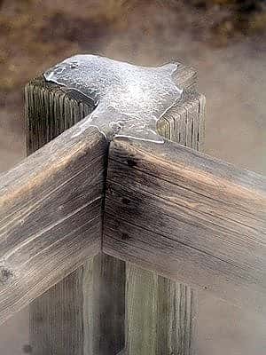 Winter in Yellowstone: ice on a fence